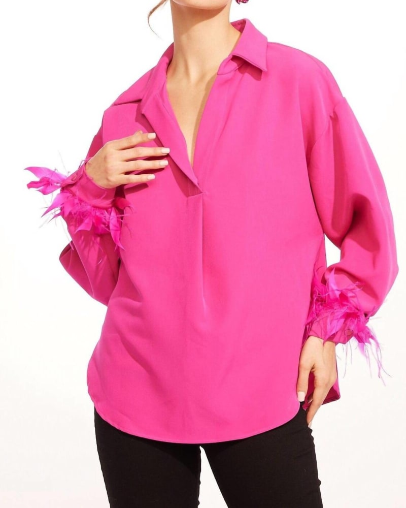 Front of a model wearing a size XL Dolvan Top in Fuchsia in Fuchsia by EVA FRANCO. | dia_product_style_image_id:333507